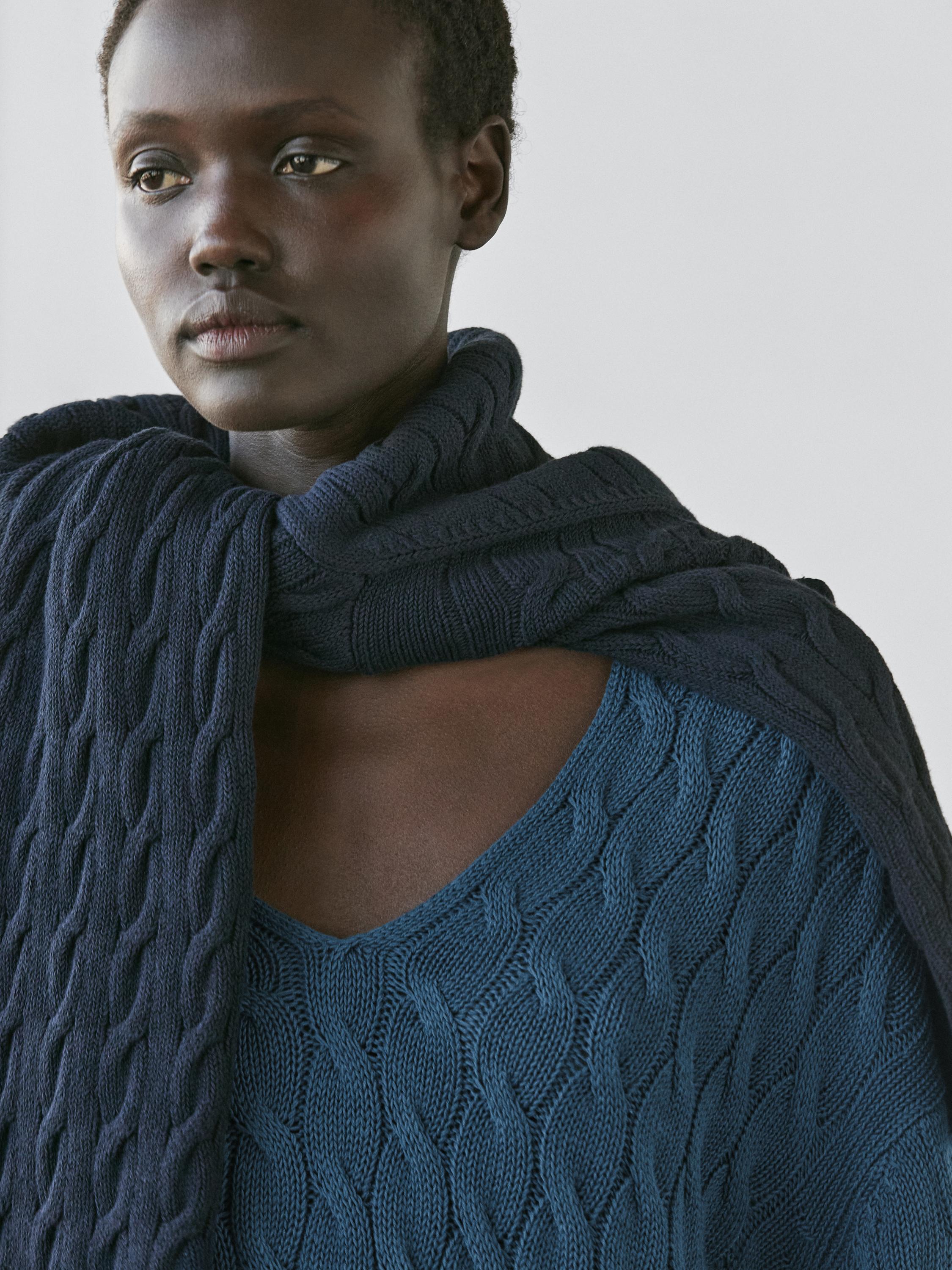 Cotton blend knit sweater with knot details